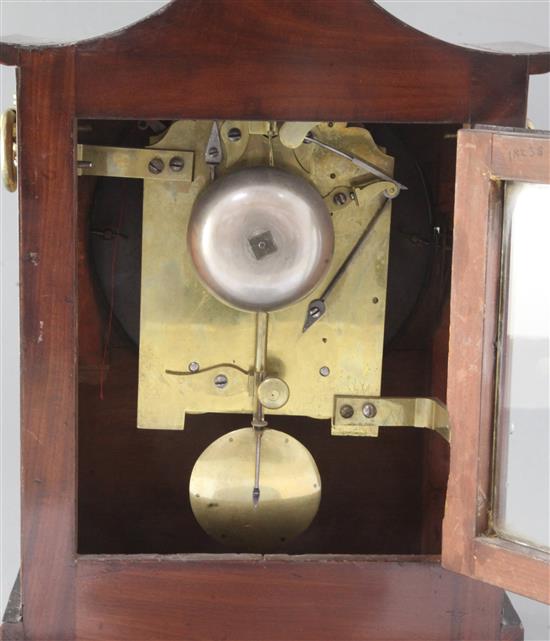 An early 19th century brass inlaid mahogany table clock and wall bracket